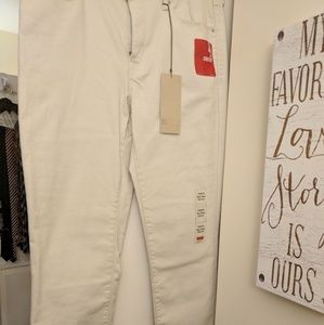 Levi's white mid rise skinny jeans